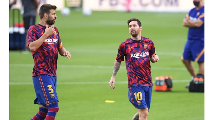 Gerard Piqué y Lionel Messi durante un entrenamiento del Barcelona.