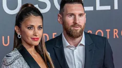 Lionel Messi y su esposa en evento público.