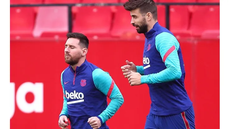 Lionel Messi y Gerard Piqué en el entrenamiento del Barcelona.