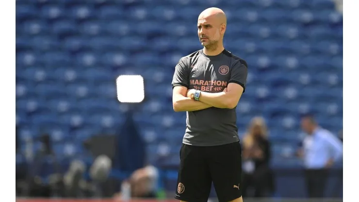 Pep Guardiola durante un encuentro con Manchester City.