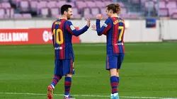 Lionel Messi y Antoine Griezmann durante un encuentro con Barcelona.
