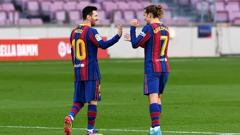 Lionel Messi y Antoine Griezmann durante un encuentro con Barcelona.