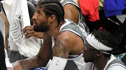 Paul George y Reggie Jackson.