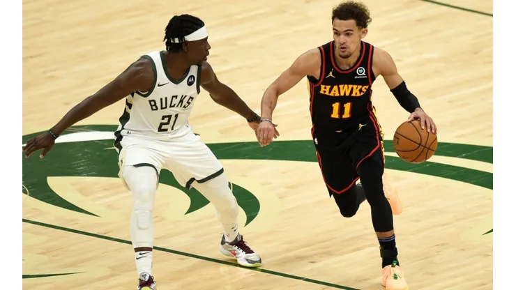 Jrue Holiday y Trae Young