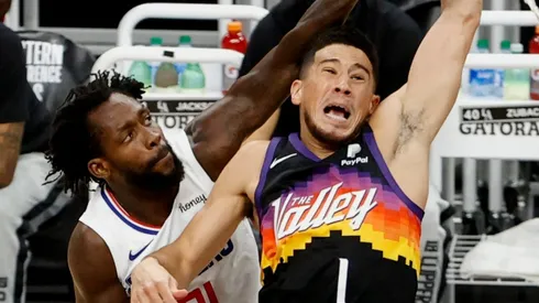 Patrick Beverley y Devin Booker