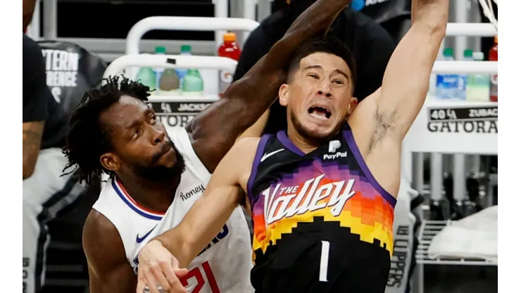 Patrick Beverley y Devin Booker