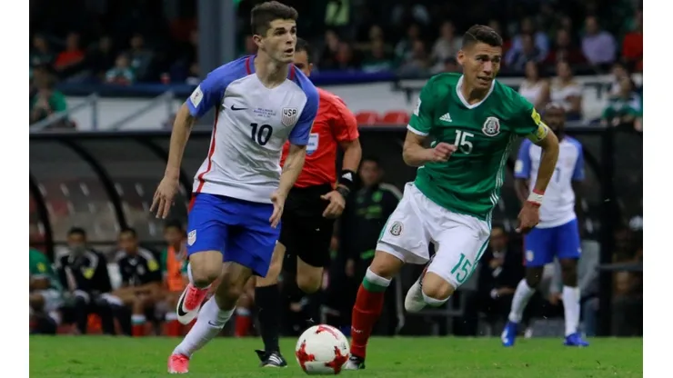 Christian Pulisic y Héctor Moreno