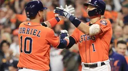 Yuli Gurriel y Carlos Correa
