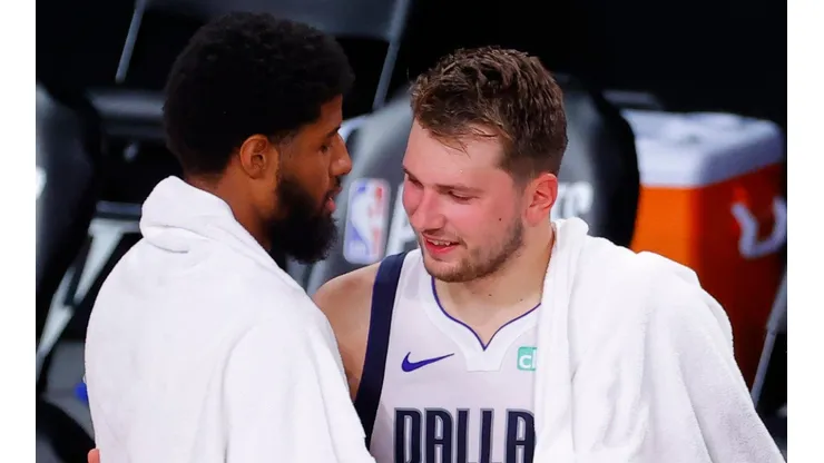 Paul George y Luka Doncic