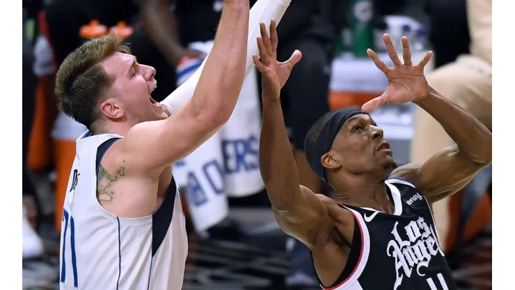 Luka Doncic y Rajon Rondo