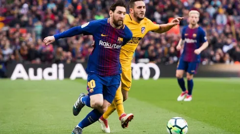 Leo Messi y Koke durante un Barcelona vs. Atlético de Madrid.