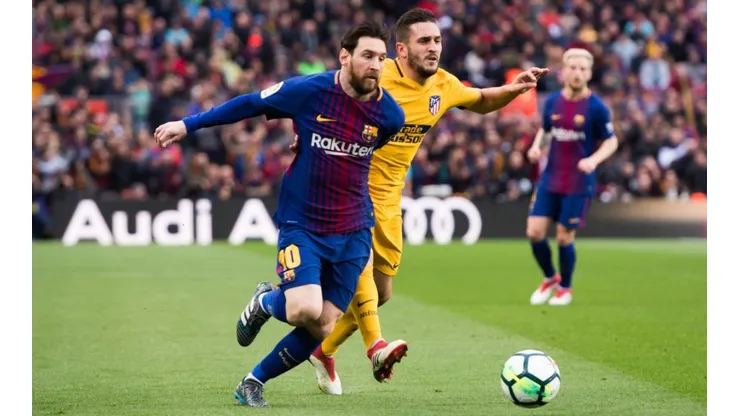 Leo Messi y Koke durante un Barcelona vs. Atlético de Madrid.