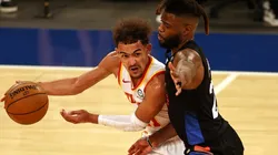 Trae Young y Reggie Bullock