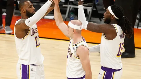Alex Caruso, LeBron James y Montrezl Harrell