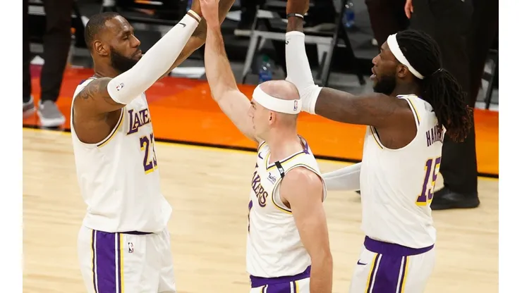 Alex Caruso, LeBron James y Montrezl Harrell