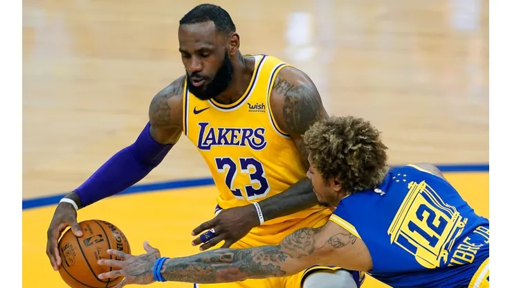 LeBron James y Kelly Oubre Jr