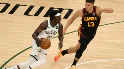 Jrue Holiday ante Bogdan Bogdanovic