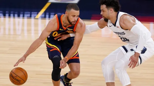 Stephen Curry y Dillon Brooks