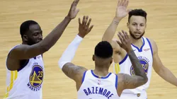 Draymond Green, Kent Bazemore y Stephen Curry