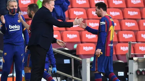 Ronald Koeman y Lionel Messi durante un encuentro con Barcelona.