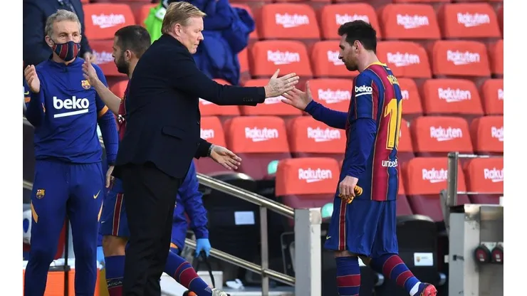 Ronald Koeman y Lionel Messi durante un encuentro con Barcelona.