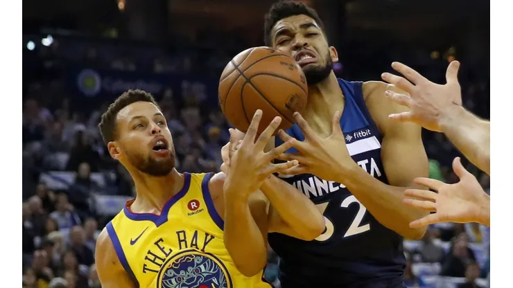 Stephen Curry y Karl-Anthony Towns