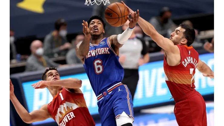 Facundo Campazzo bloqueando a Elfrid Payton