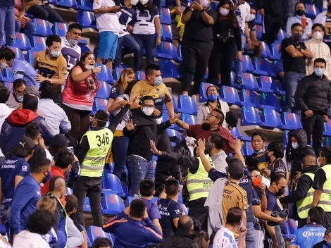 Aficionados de Pumas se pelean entre ellos y agreden a una mujer