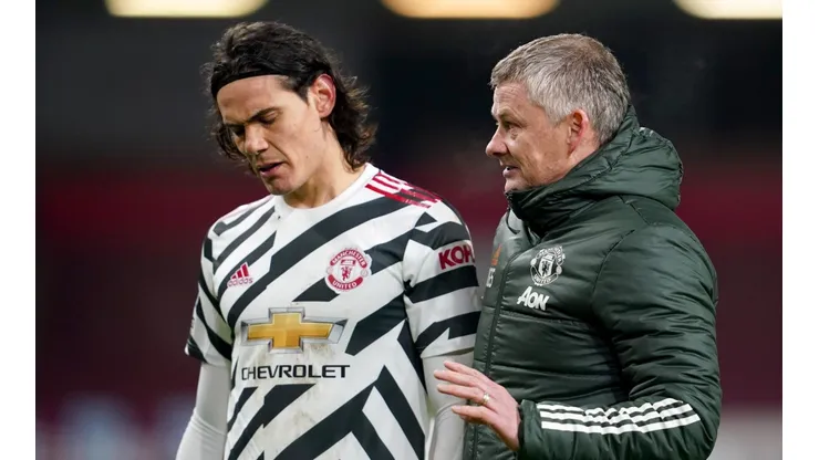 Edinson Cavani junto a Ole Gunnar Solskjaer.