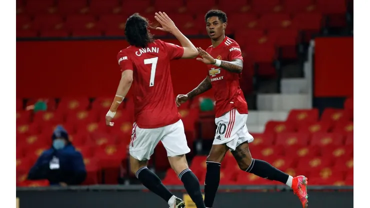 El festejo de Cavani y Rashford en el empate transitorio.