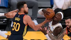 Stephen Curry y Dennis Schroeder