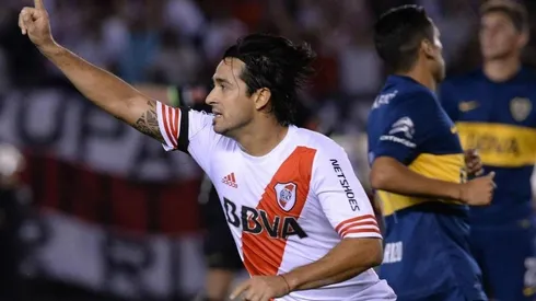 Leonardo Pisculichi festejando su gol ante Boca en 2014.