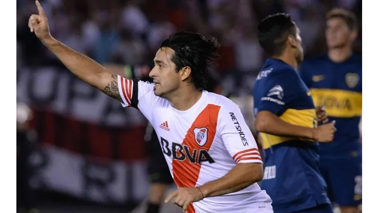 Leonardo Pisculichi festejando su gol ante Boca en 2014.