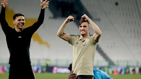 Magallán y Tagliafico, en semifinales de Champions League.