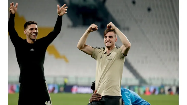 Magallán y Tagliafico, en semifinales de Champions League.