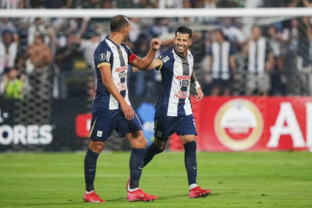 Pablo Ceppelini y Hernán Barcos. (Foto: CONMEBOL Libertadores).