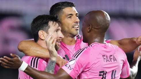 Lionel Messi Luis Suárez y Fafa Picault.