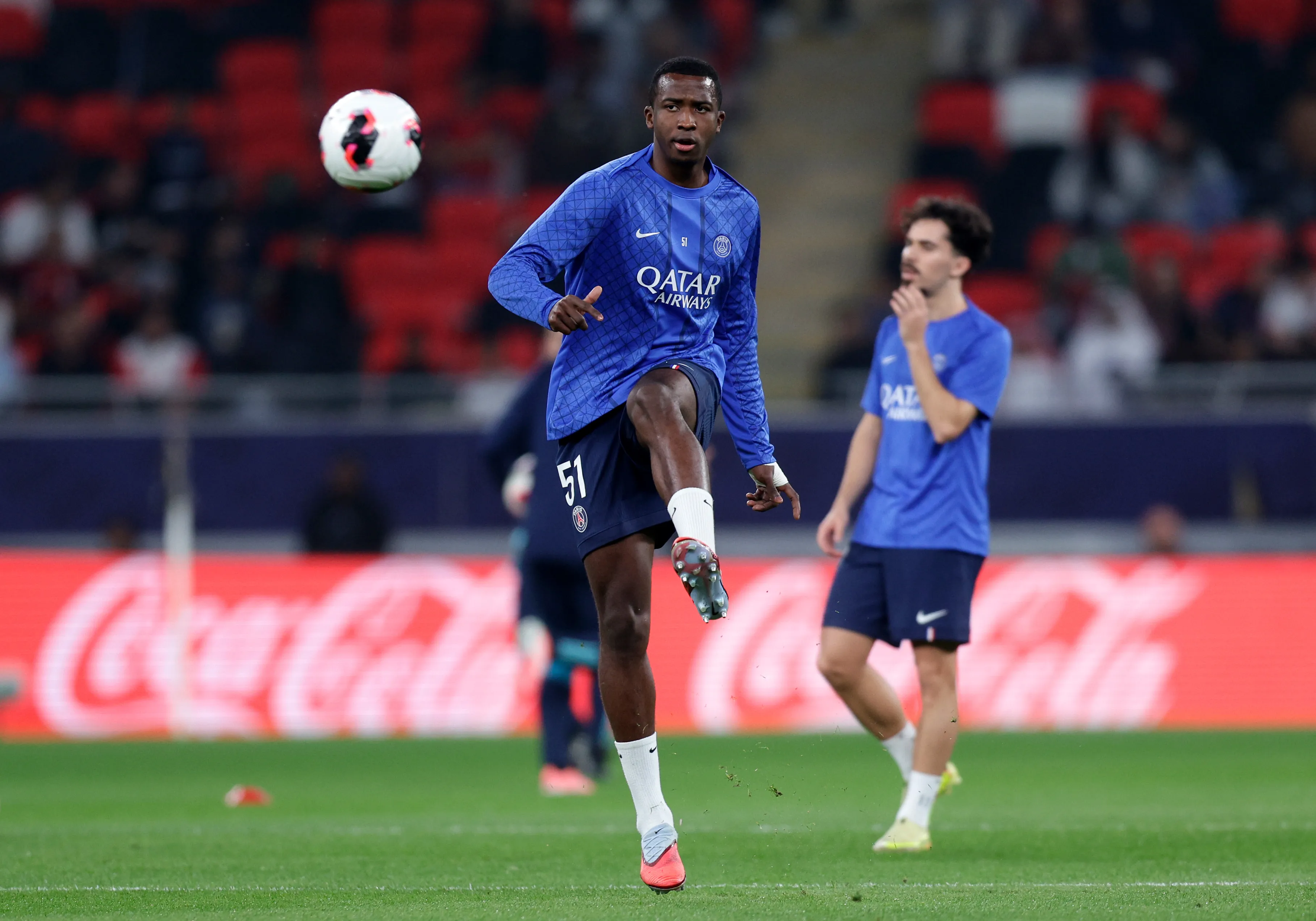 DOHA, QATAR – DECEMBER 17: William Pacho of Paris Saint-Germain warms up prior to the FIFA Intercontinental Cup 2025 final match between Paris Saint-Germain and CR Flamengo at Ahmad Bin Ali Stadium on December 17, 2025 in Doha, Qatar.  (Photo by Getty Images/Getty Images)