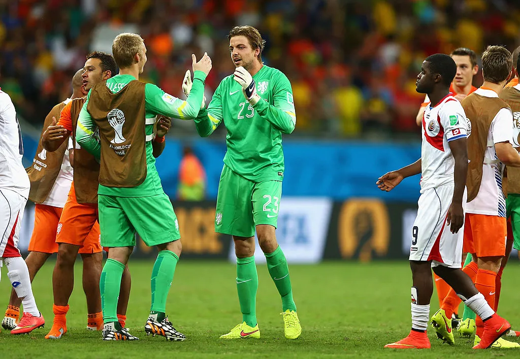 SALVADOR, BRAZIL – JULY 05: Tim Krul of the Netherlands celebrates with Jasper Cillessen after the 2014 FIFA World Cup Brazil Quarter Final match between Netherlands and Costa Rica at Arena Fonte Nova on July 5, 2014 in Salvador, Brazil. (Photo by Michael Steele/Getty Images)