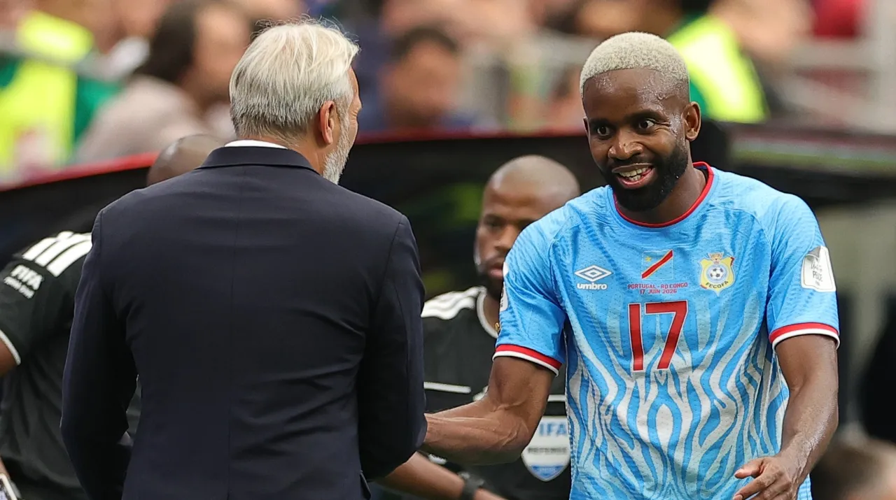 Sébastien Desabre y Cedric Bakambu. (Foto: Getty Images)