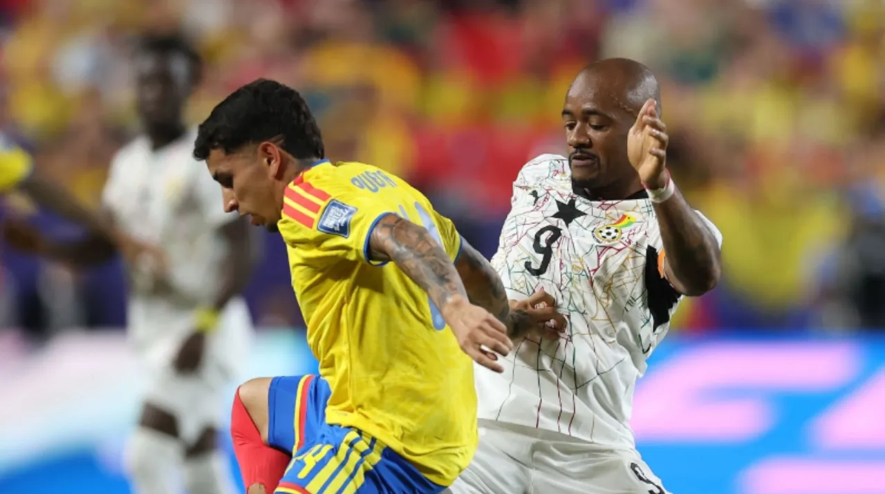 Gustavo Puerta y Jordan Ayew. (Foto: Getty Images)
