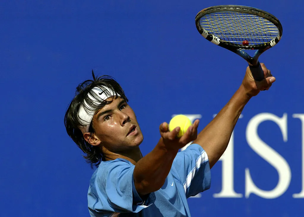 MONTE CARLO – APRIL 15:   Rafael Nadal of Spain serves to against Karol Kucera of Slovakia during the first round of the Tennis Masters at The Monte Carlo Country Club, Monaco on April 15, 2003.  (Photo by Clive Brunskill/Getty Images)