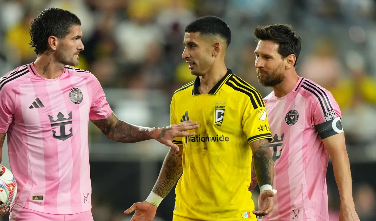 De Paul Rodríguez y Messi. (Foto: Getty)
