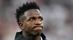MADRID, SPAIN - MAY 09: Vinicius Junior of Real Madrid lines up on the pitch prior to the UEFA Champions League semi-final first leg match between Real Madrid and Manchester City FC at Estadio Santiago Bernabeu on May 09, 2023 in Madrid, Spain. (Photo by Angel Martinez/Getty Images)