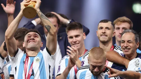 LUSAIL CITY, QATAR - DECEMBER 18: Gonzalo Montiel of Argentina lifts the FIFA World Cup Qatar 2022 Winner's Trophy during the FIFA World Cup Qatar 2022 Final match between Argentina and France at Lusail Stadium on December 18, 2022 in Lusail City, Qatar. (Photo by Julian Finney/Getty Images)