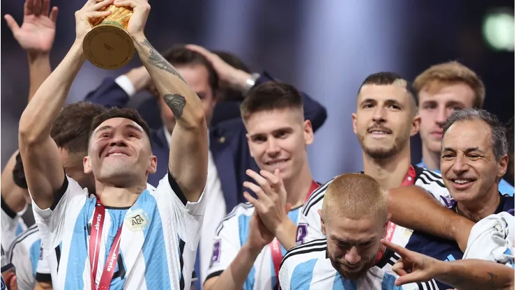 LUSAIL CITY, QATAR - DECEMBER 18: Gonzalo Montiel of Argentina lifts the FIFA World Cup Qatar 2022 Winner's Trophy during the FIFA World Cup Qatar 2022 Final match between Argentina and France at Lusail Stadium on December 18, 2022 in Lusail City, Qatar. (Photo by Julian Finney/Getty Images)