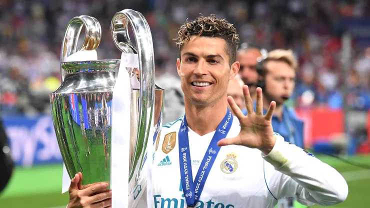 KIEV, UKRAINE - MAY 26: Cristiano Ronaldo of Real Madrid lifts The UEFA Champions League trophy following his sides victory in during the UEFA Champions League Final between Real Madrid and Liverpool at NSC Olimpiyskiy Stadium on May 26, 2018 in Kiev, Ukraine. (Photo by Laurence Griffiths/Getty Images)