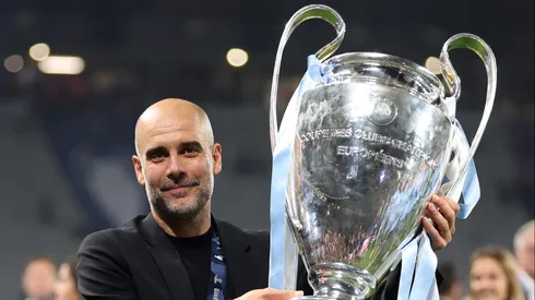 ISTANBUL, TURKEY - JUNE 10: Pep Guardiola, Manager of Manchester City, celebrates with the UEFA Champions League trophy after the team's victory during the UEFA Champions League 2022/23 final match between FC Internazionale and Manchester City FC at Atatuerk Olympic Stadium on June 10, 2023 in Istanbul, Turkey. (Photo by Catherine Ivill/Getty Images)