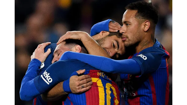 BARCELONA, SPAIN - DECEMBER 18: Luis Suarez (C) of FC Barcelona celebrates with his team mates Lionel Messi (L) and Neymar Jr.after scoring his team's second goal during the La Liga match between FC Barcelona and RCD Espanyol at the Camp Nou stadium on December 18, 2016 in Barcelona, Spain. (Photo by David Ramos/Getty Images)