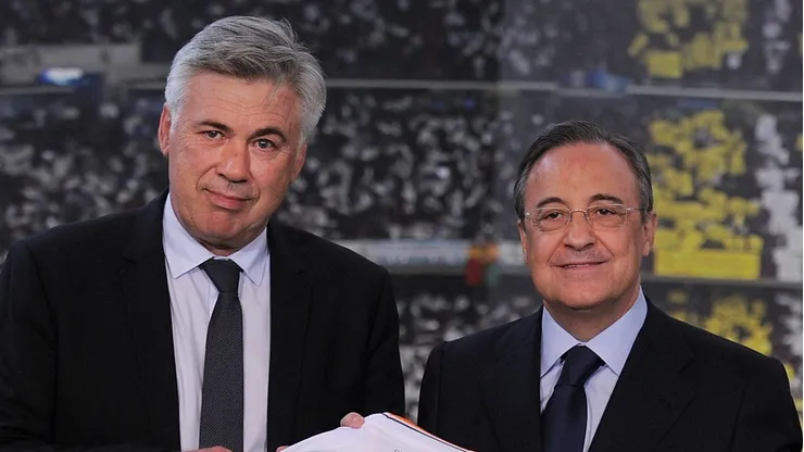 MADRID, SPAIN - JUNE 26: Carlo Ancelotti (L) holds up a Real Madrid shirt as he stands alongside club president Florentino Perez while being presented as Real Madrid's new head coach at Estadio Bernabeu on June 26, 2013 in Madrid, Spain. (Photo by Denis Doyle/Getty Images)